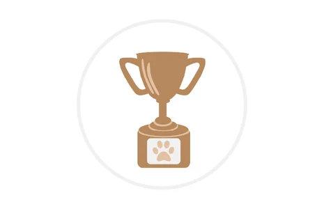 Icon: Stilisierter Pokal mit Pfotenabdruck auf dem Sockel