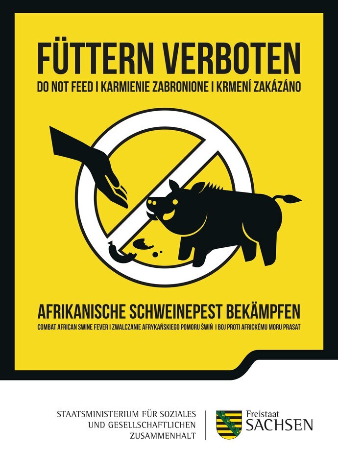 Zooplakat »Füttern verboten«.